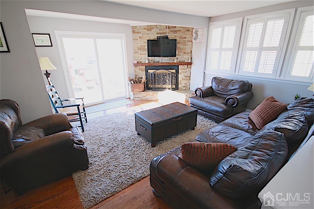 177 Midfield Road Colonia, NJ 07067 - Photo 6 of 20 a living room with furniture and a flat screen tv