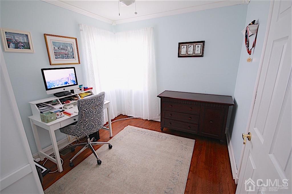177 Midfield Road Colonia, NJ 07067 - Photo 9 of 20 a bedroom with a bed and a desk