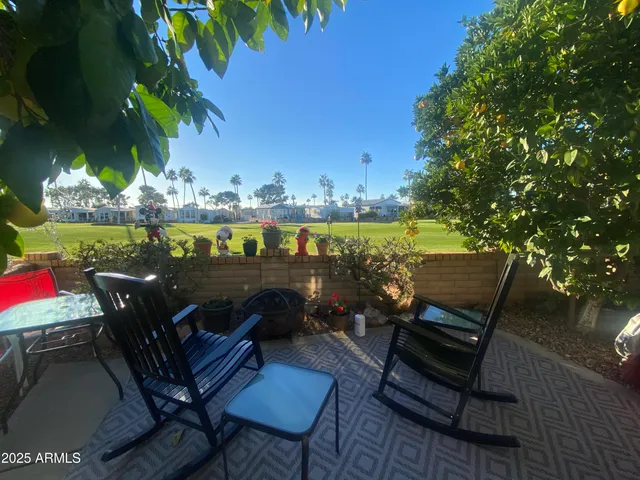 a view of a chairs and table on the wooden floor