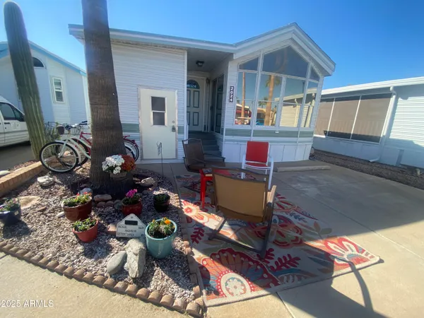 a front view of a house with patio