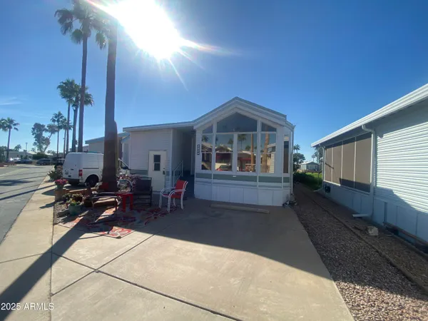 a view of a house with sitting area