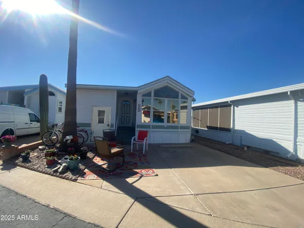a view of house with patio outdoor seating