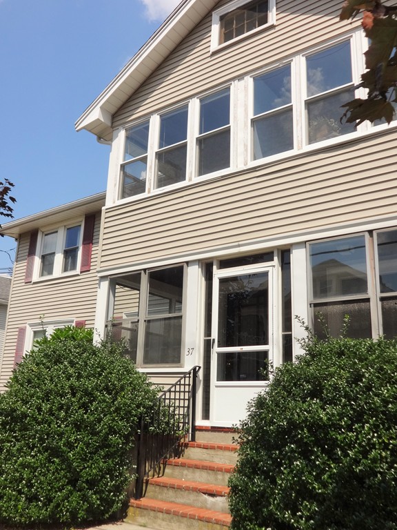 a house view with a garden space