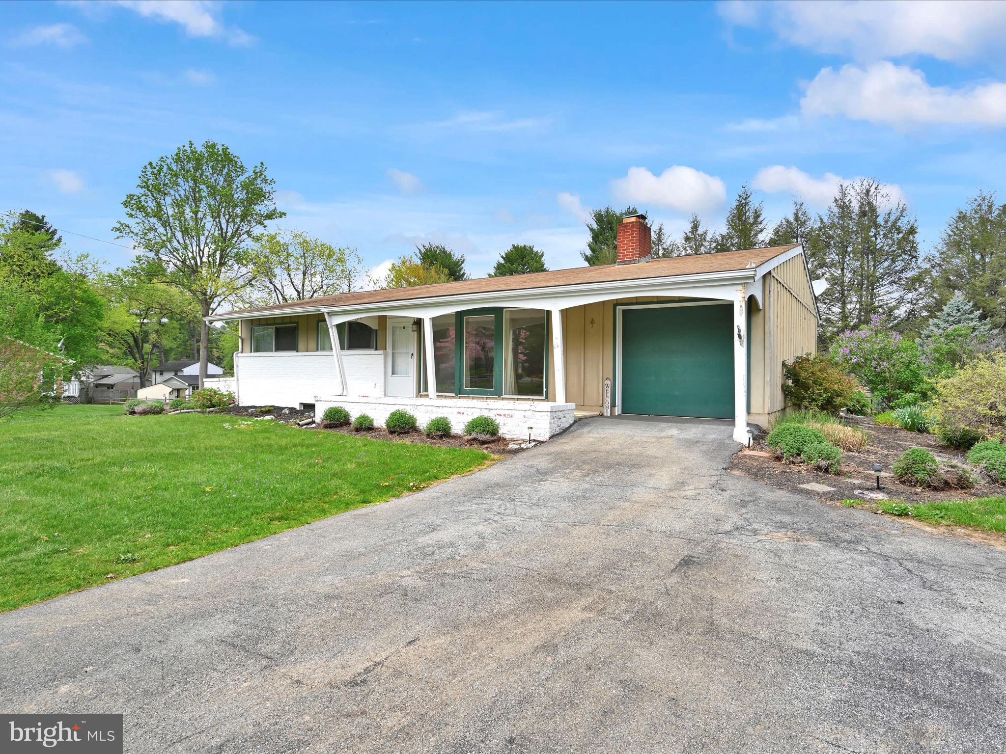 601 Valley Road Lancaster, PA 17601 - Photo 3 of 33 a front view of a house with garden
