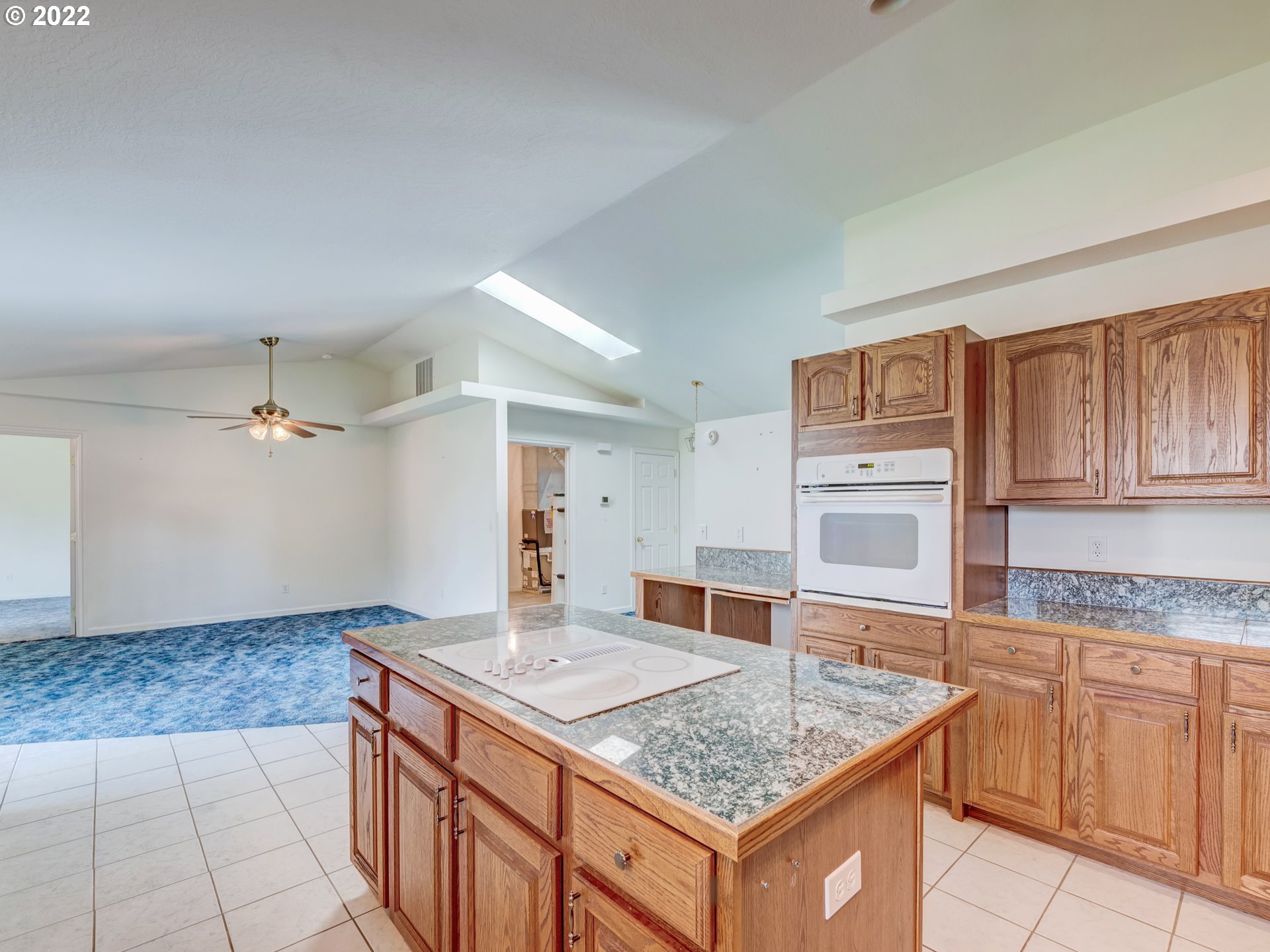 924 S Street Springfield, OR 97477 - Photo 11 of 30 a kitchen with granite countertop a sink and cabinets