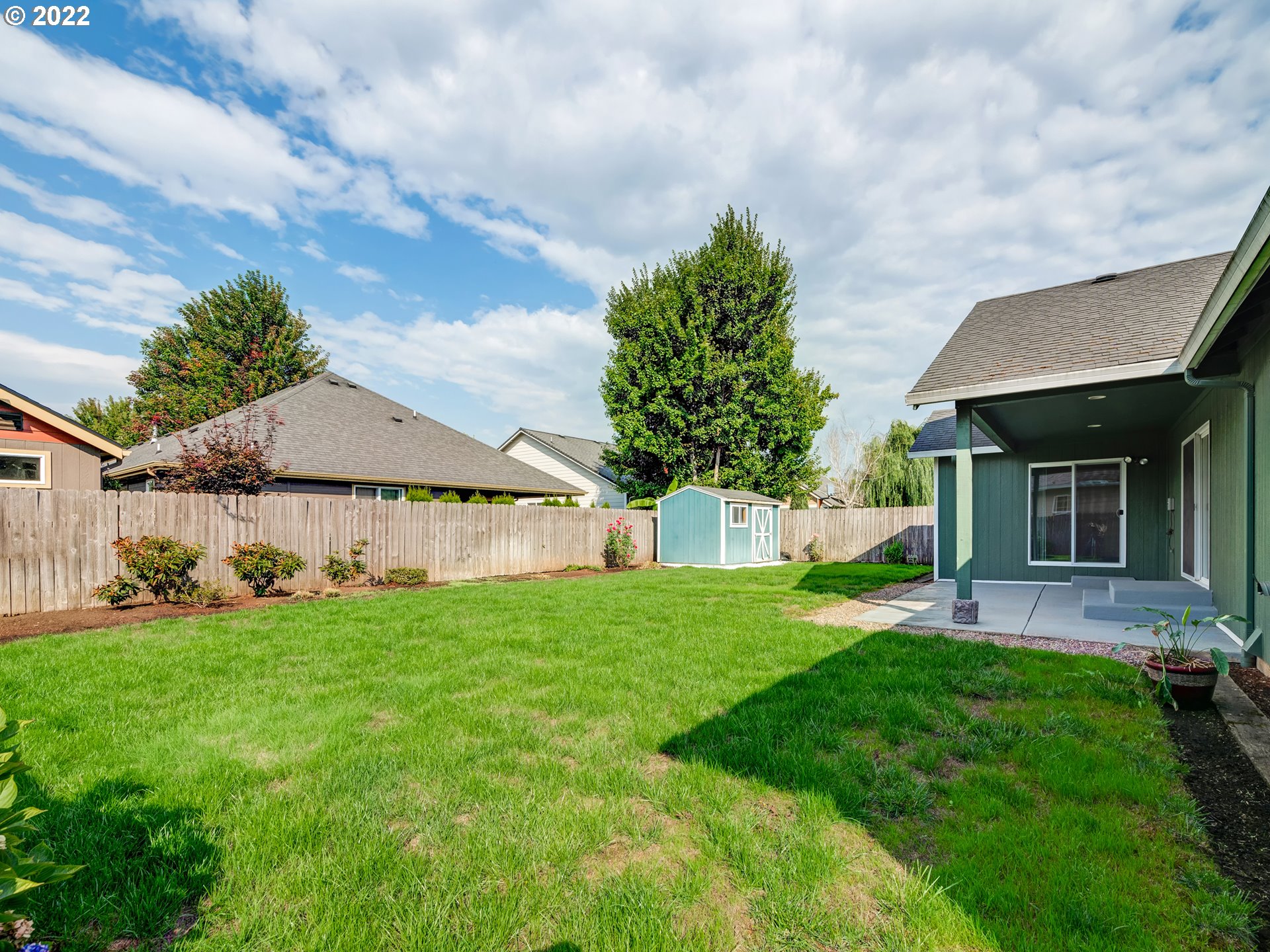924 S Street Springfield, OR 97477 - Photo 29 of 30 a view of a house with a yard and sitting area
