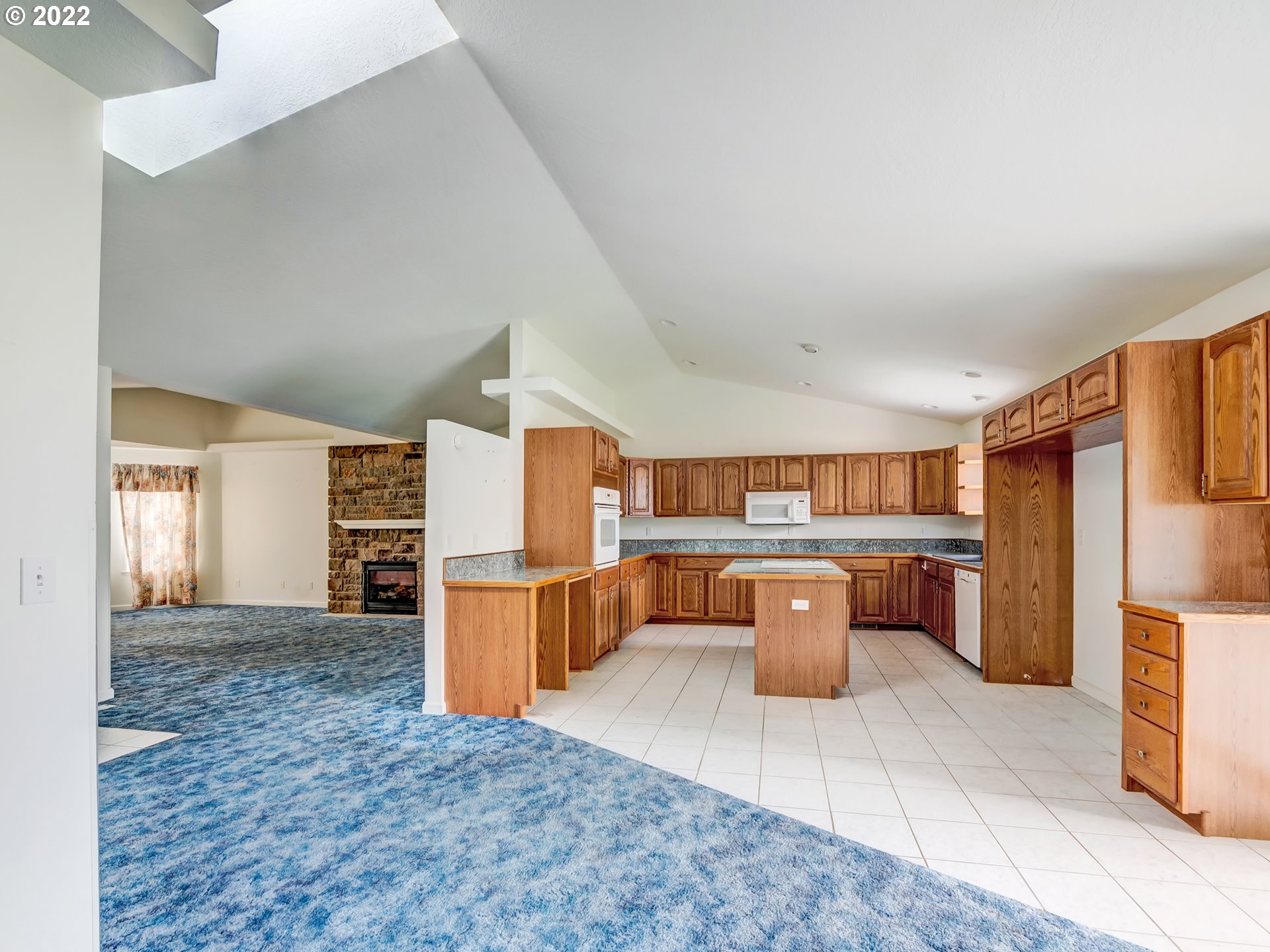 924 S Street Springfield, OR 97477 - Photo 8 of 30 a kitchen with a refrigerator and a sink