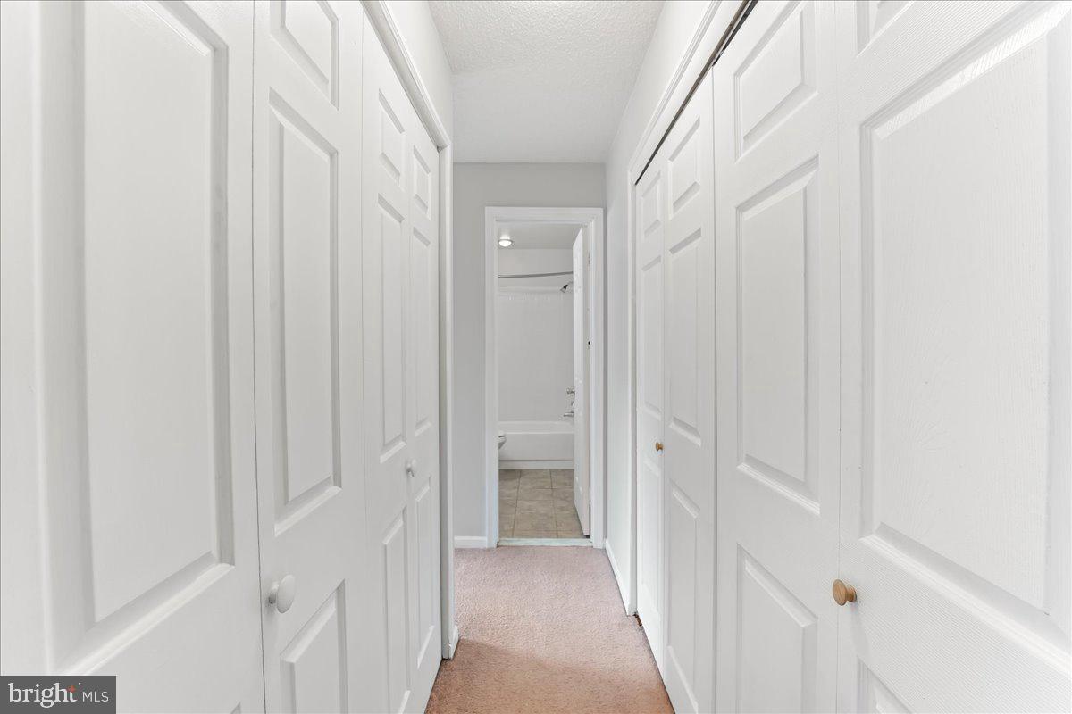 44 Witherspoon Court, Unit 137 Chesterbrook, PA 19087 - Photo 20 of 26 a view of a hallway with wooden floor