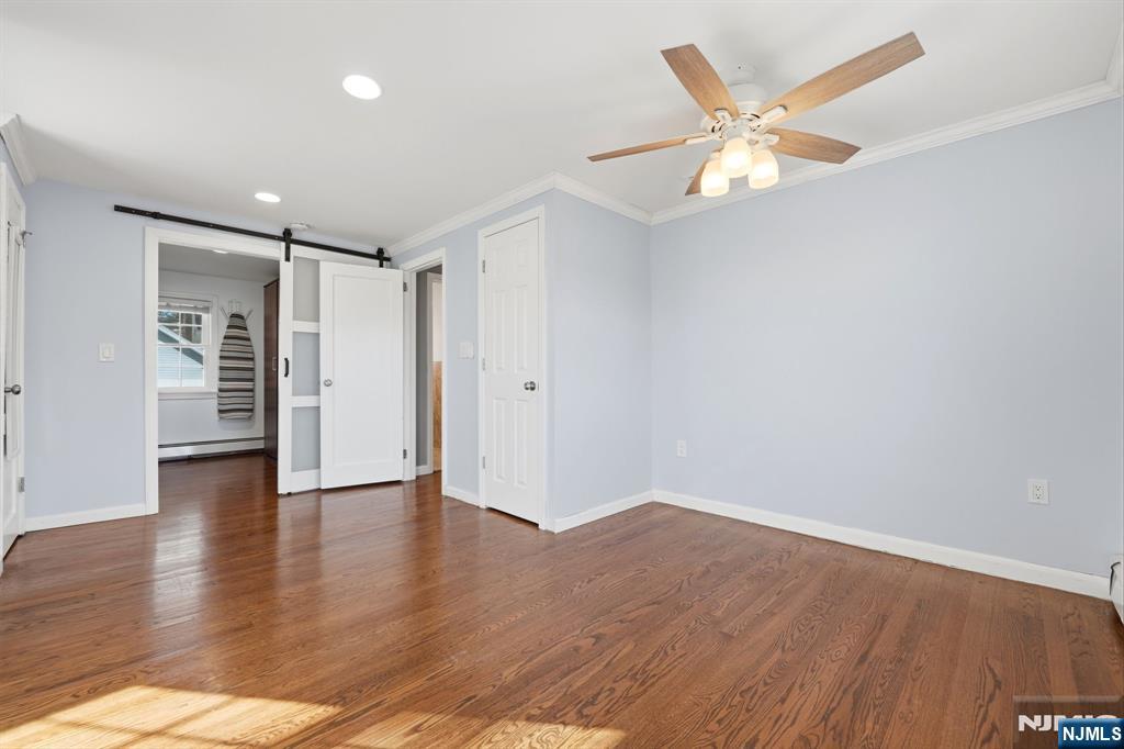 44 Alpine Place Kearny, NJ 07032 - Photo 32 of 50 a view of an empty room with wooden floor
