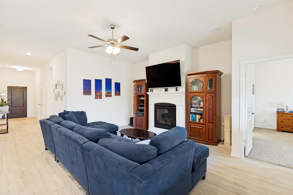 623 Stars Drive Anna, TX 75409 - Photo 5 of 26 Living Room with gas fireplace and built in speakers