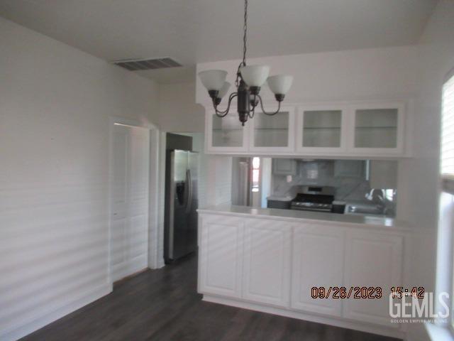 Undisclosed Address Taft, CA 93268 - Photo 24 of 28 a kitchen with stainless steel appliances granite countertop a refrigerator a stove and a sink
