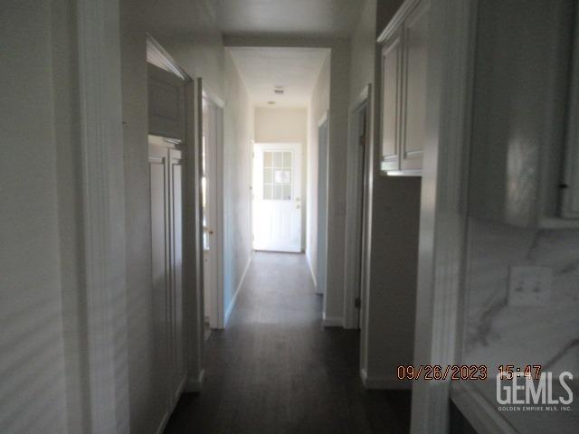Undisclosed Address Taft, CA 93268 - Photo 28 of 28 a view of a hallway with wooden floor