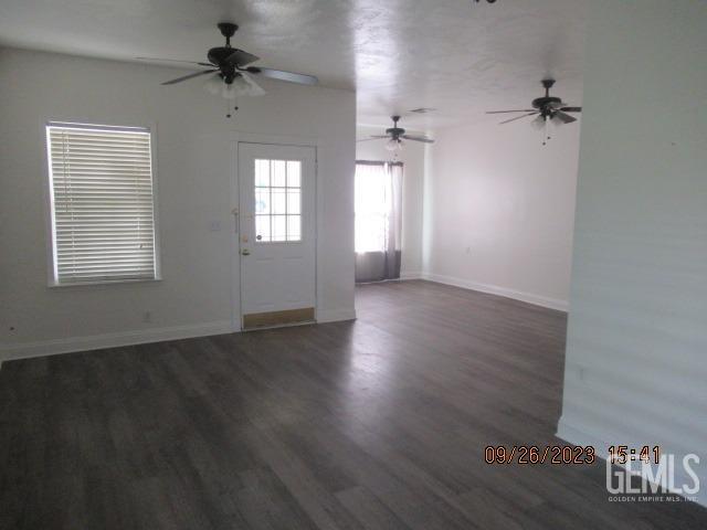 Undisclosed Address Taft, CA 93268 - Photo 9 of 28 wooden floor in an empty room with a window
