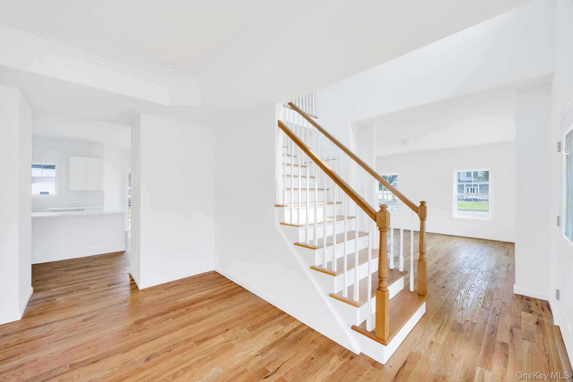 Lot #4 Cardinal Court Ridge, NY 11961 - Photo 20 of 48 a view of an entryway with wooden floor
