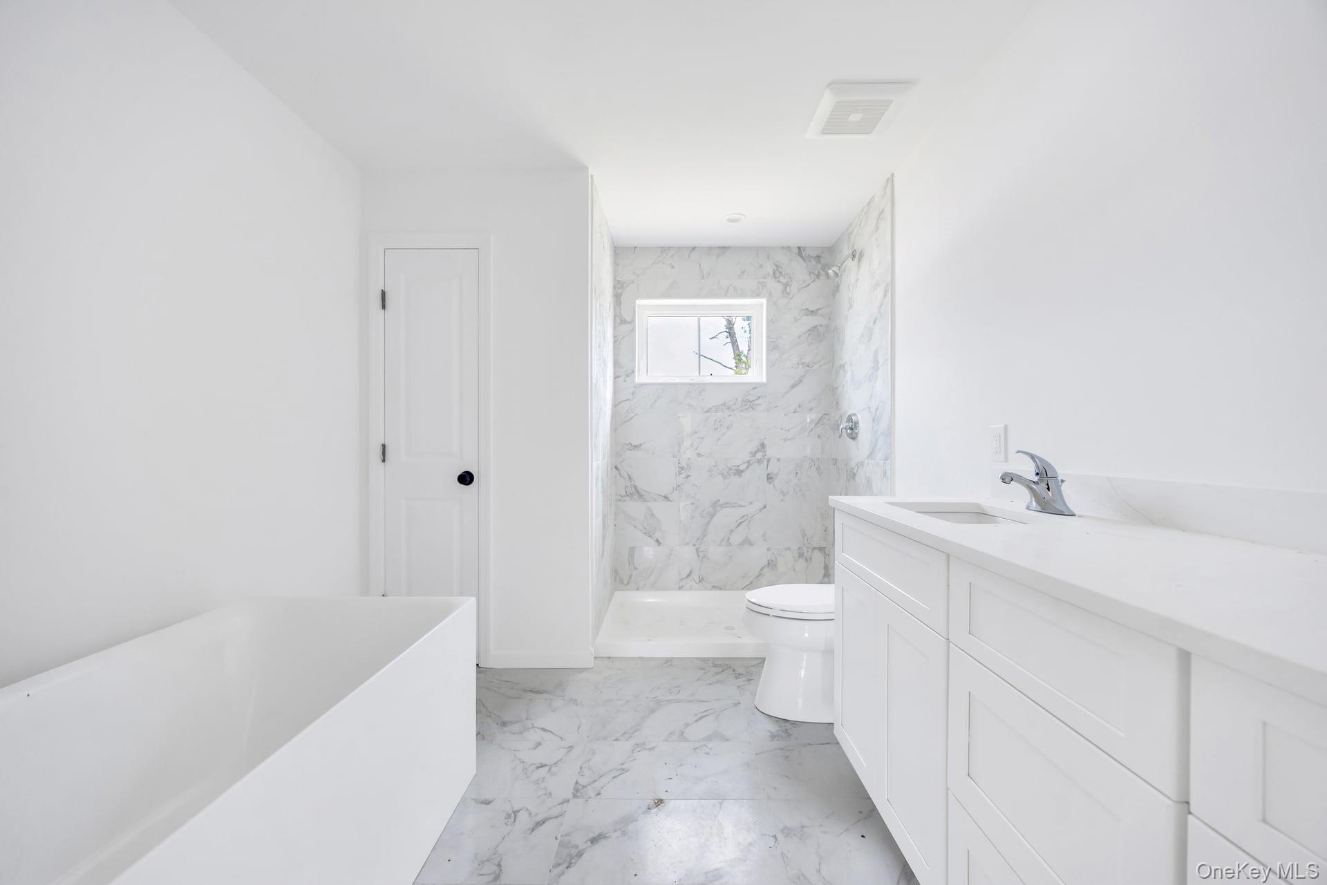 Lot #4 Cardinal Court Ridge, NY 11961 - Photo 44 of 48 a bathroom with a sink a toilet and shower