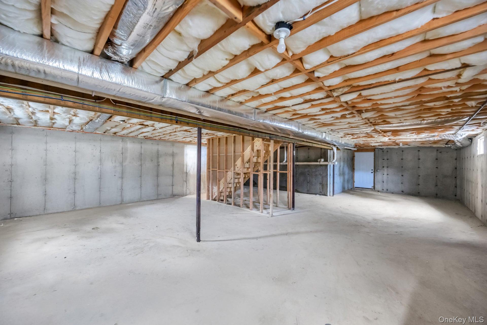 Lot #4 Cardinal Court Ridge, NY 11961 - Photo 46 of 48 a view of a room with wooden walls