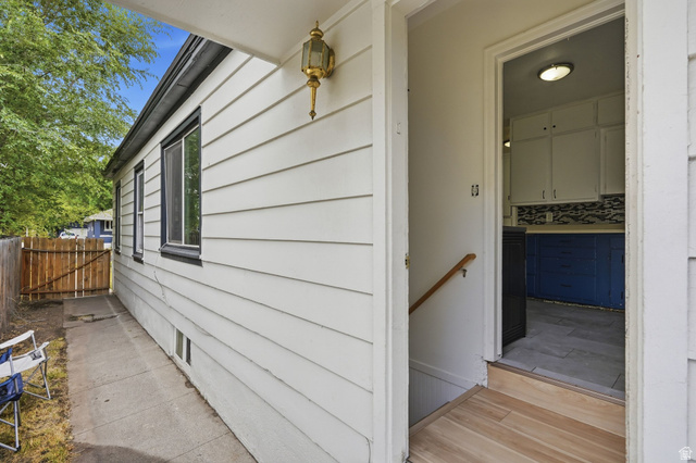 707 East 150 South Provo, UT 84606 - Photo 17 of 31 Crisp white siding with dark trim windows