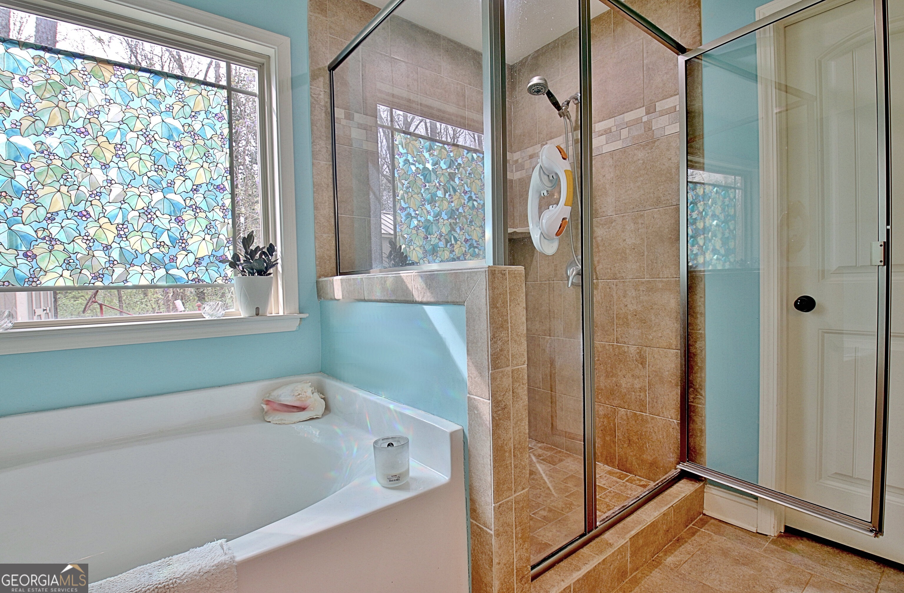96 East Gordon Road Newnan, GA 30263 - Photo 20 of 34 a bathroom with a tub and a shower