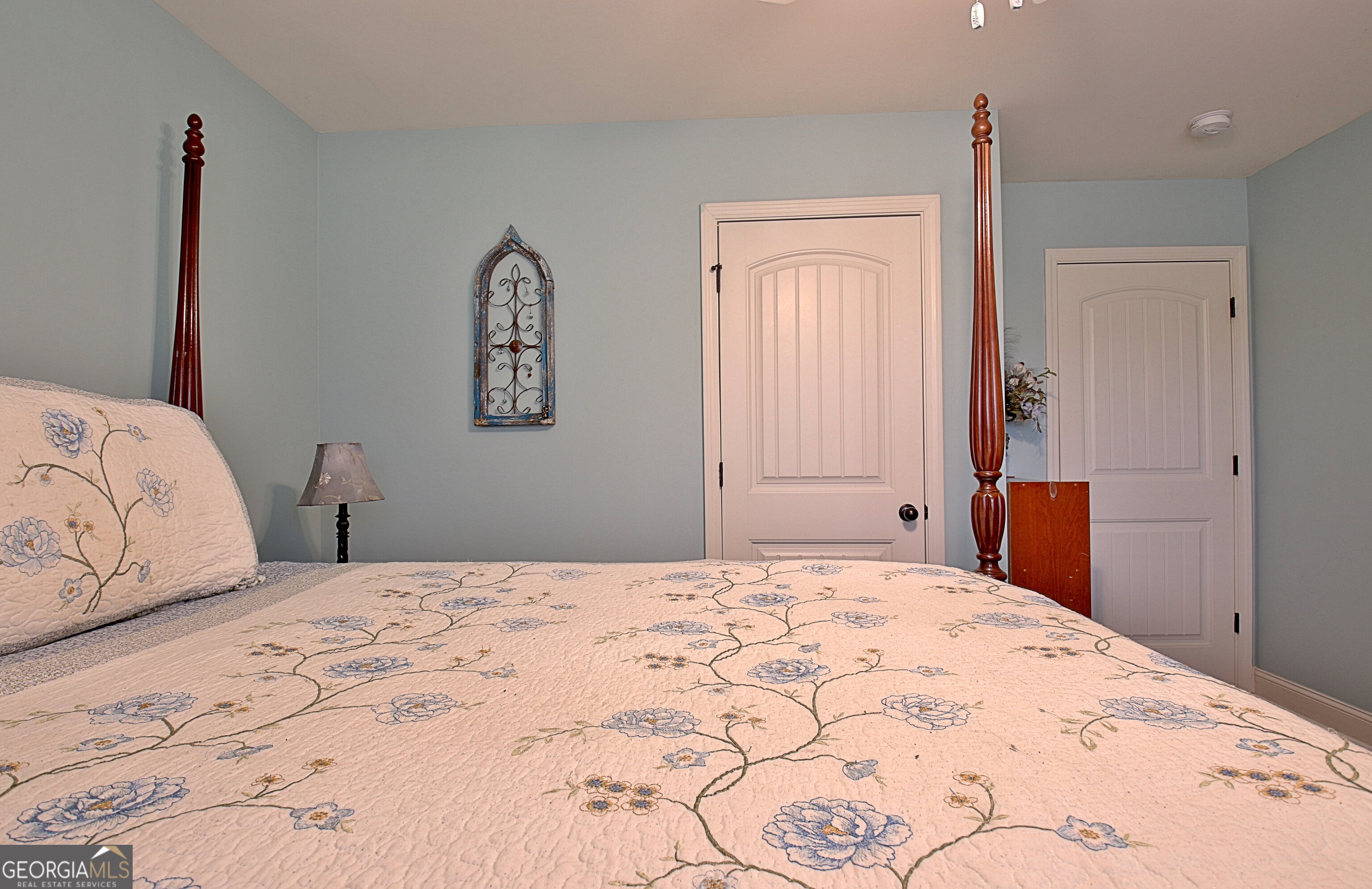 96 East Gordon Road Newnan, GA 30263 - Photo 27 of 34 a bedroom with a bed and a dresser
