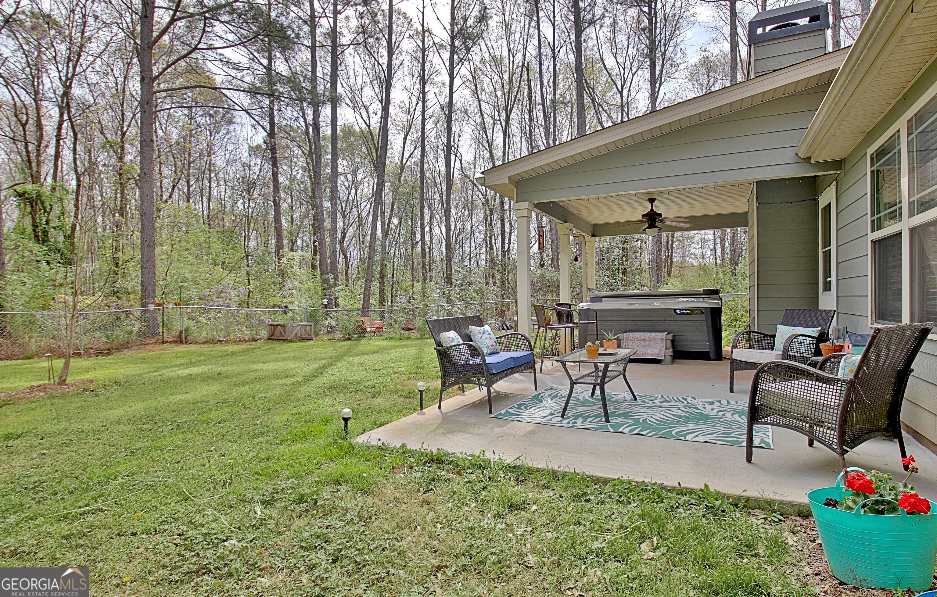96 East Gordon Road Newnan, GA 30263 - Photo 32 of 34 a view of a house with backyard and sitting area