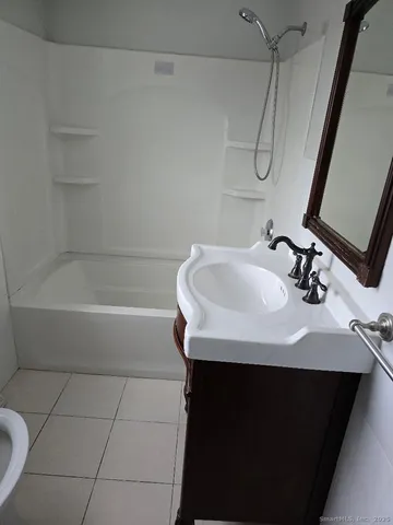 a bathroom with a sink and a bathtub