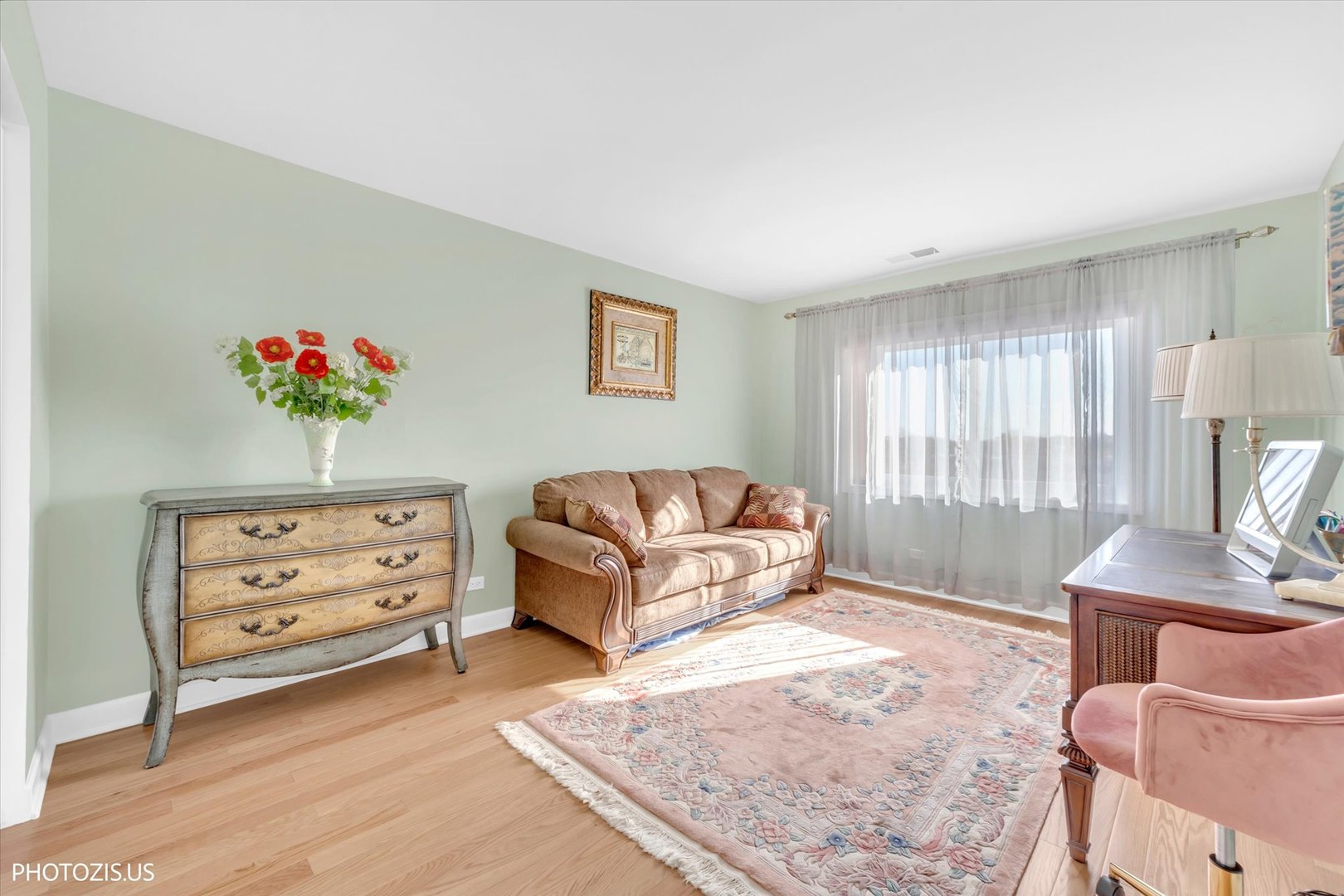 4900 Foster Street, Unit 412 Skokie, IL 60077 - Photo 16 of 32 a living room with furniture and a window