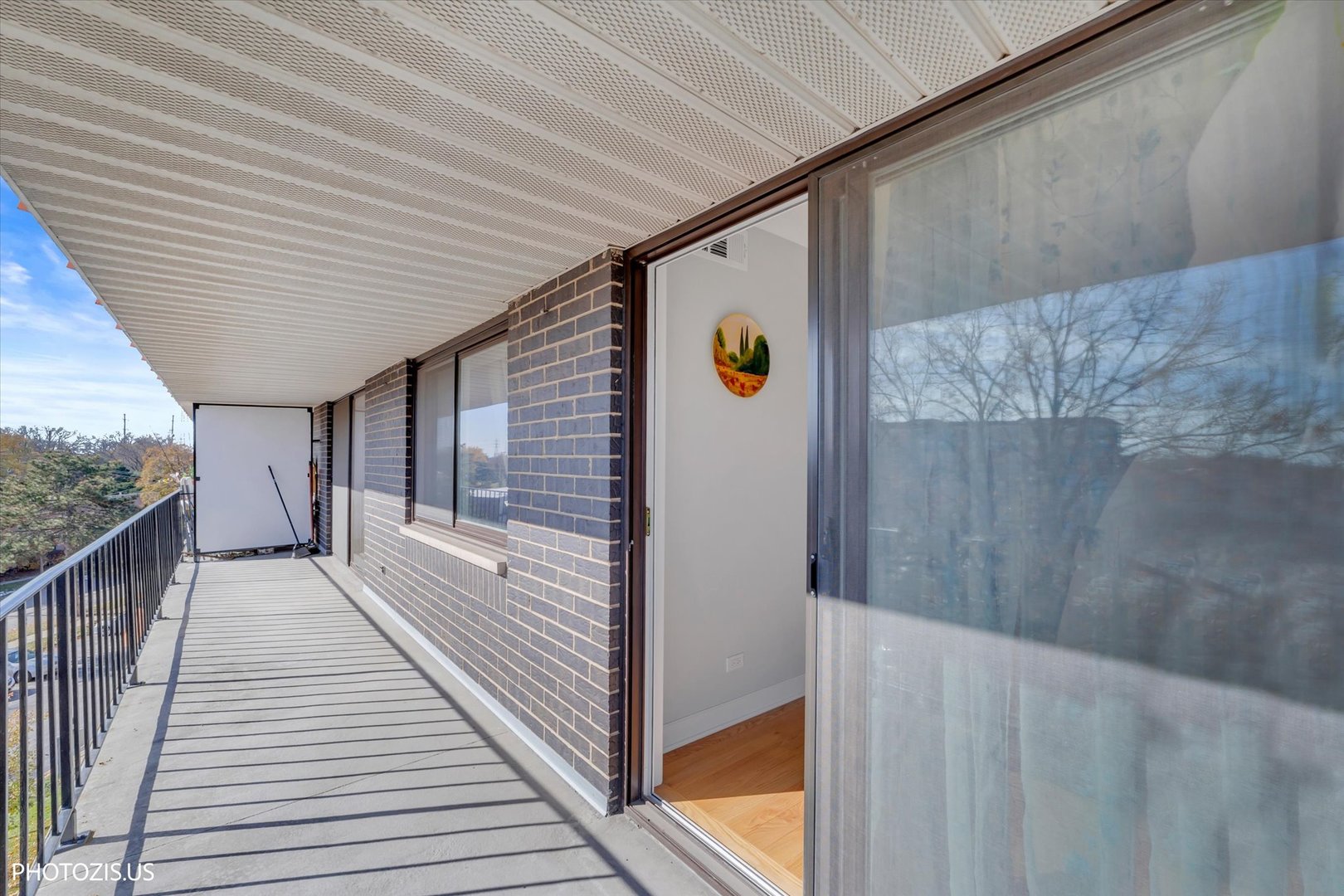 4900 Foster Street, Unit 412 Skokie, IL 60077 - Photo 20 of 32 a view of a wooden deck