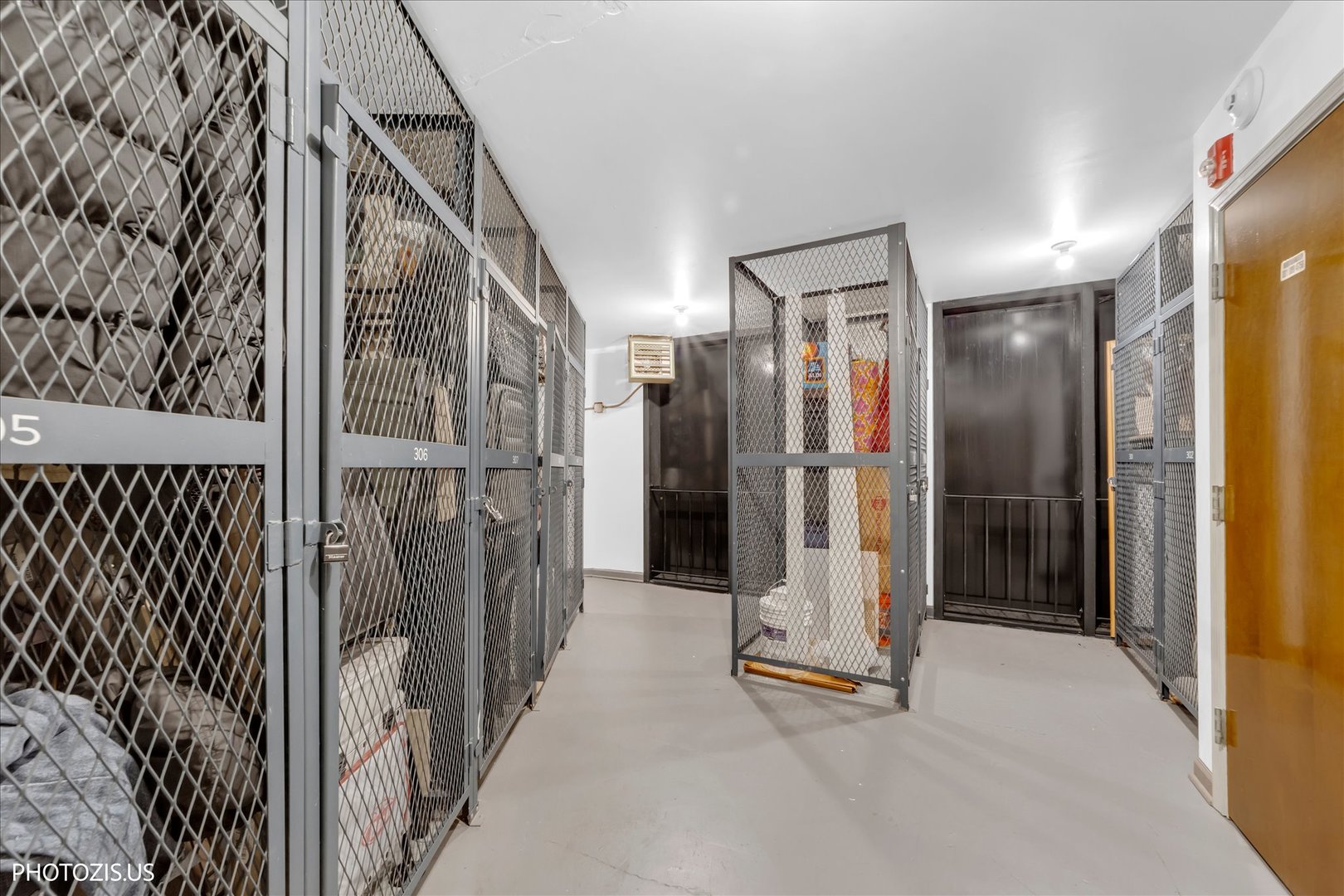 4900 Foster Street, Unit 412 Skokie, IL 60077 - Photo 26 of 32 a view of an entryway with wooden floor