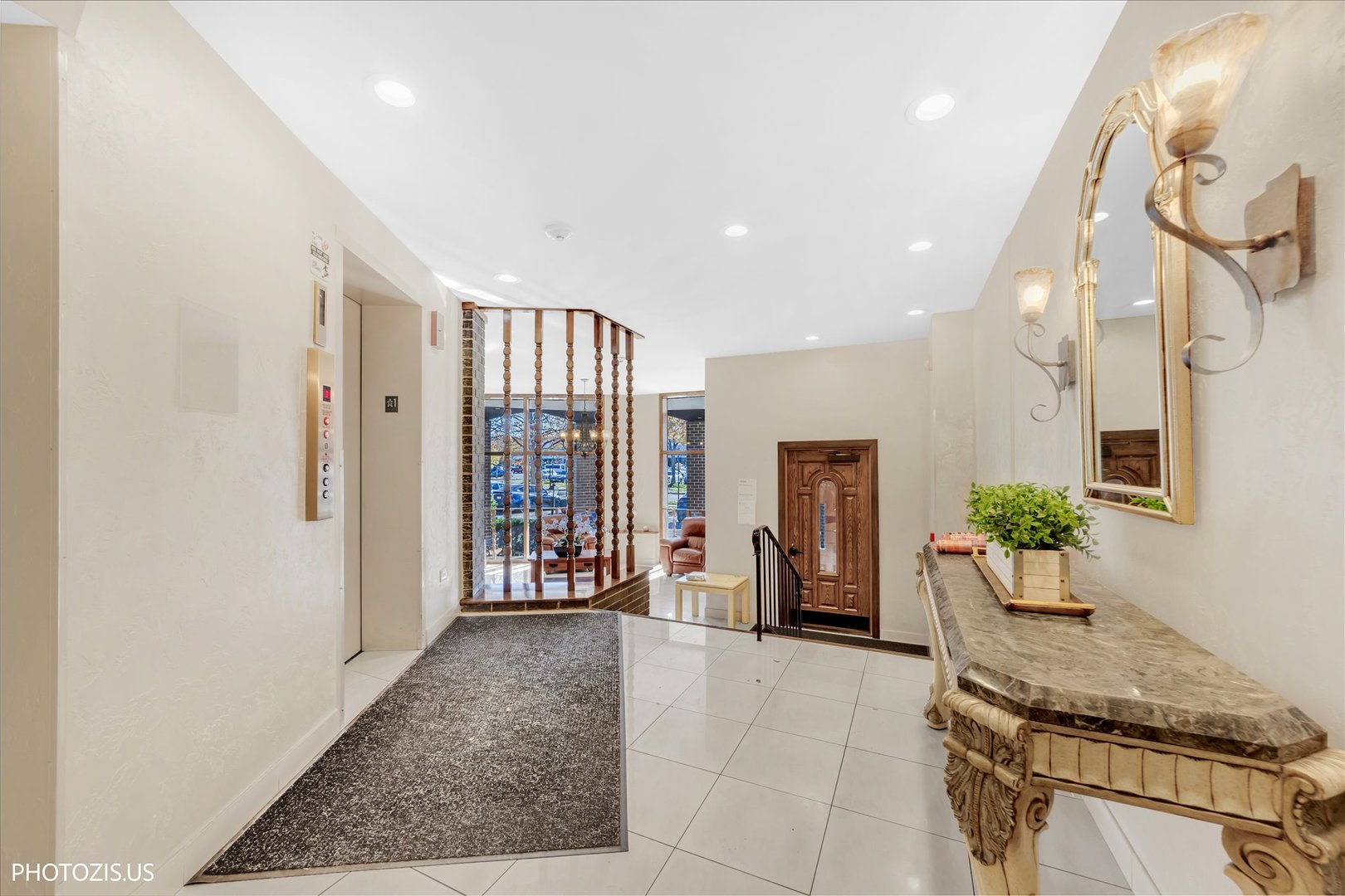 4900 Foster Street, Unit 412 Skokie, IL 60077 - Photo 3 of 32 a living room with furniture and large windows