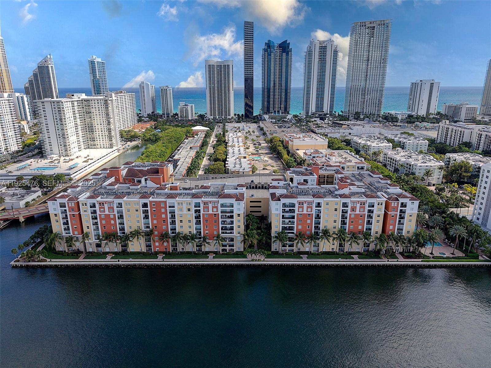 17150 North Bay Road, Unit 2706 Sunny Isles Beach, FL 33160 - Photo 1 of 47 a view of a city with tall buildings