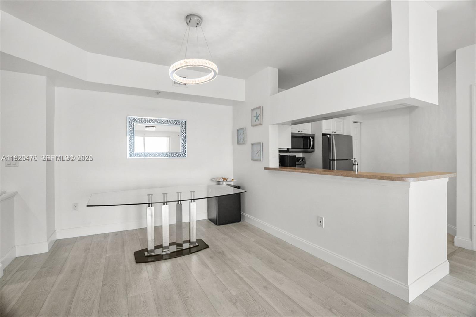 17150 North Bay Road, Unit 2706 Sunny Isles Beach, FL 33160 - Photo 16 of 47 a room with gym equipment and view