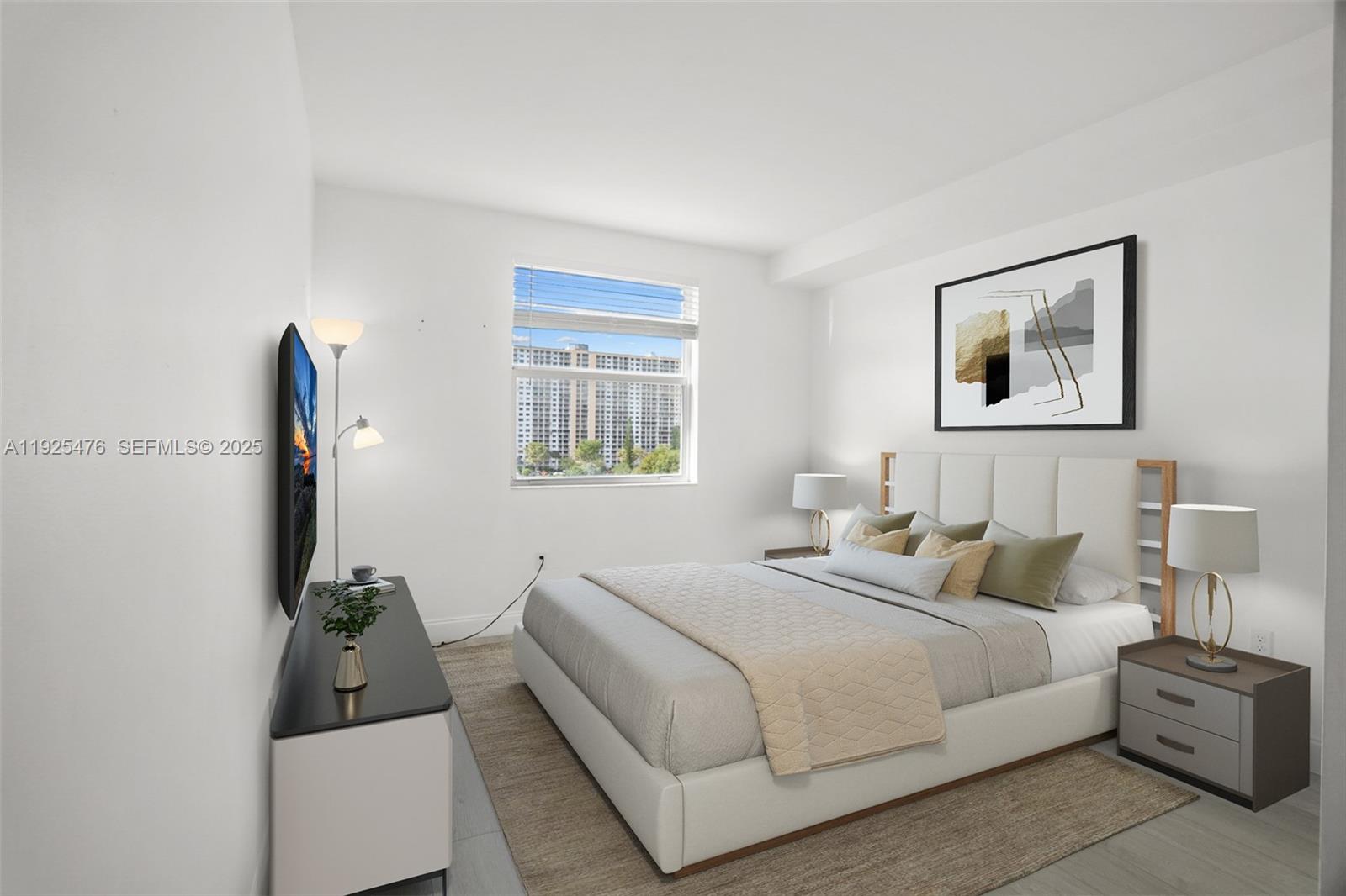 17150 North Bay Road, Unit 2706 Sunny Isles Beach, FL 33160 - Photo 24 of 47 a bedroom with a bed and a night stand