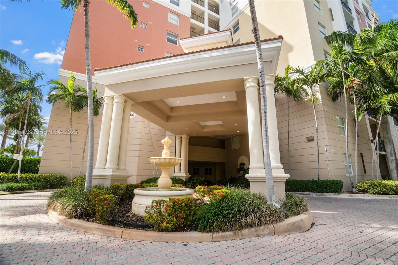 17150 North Bay Road, Unit 2706 Sunny Isles Beach, FL 33160 - Photo 31 of 47 a front view of a house with garden