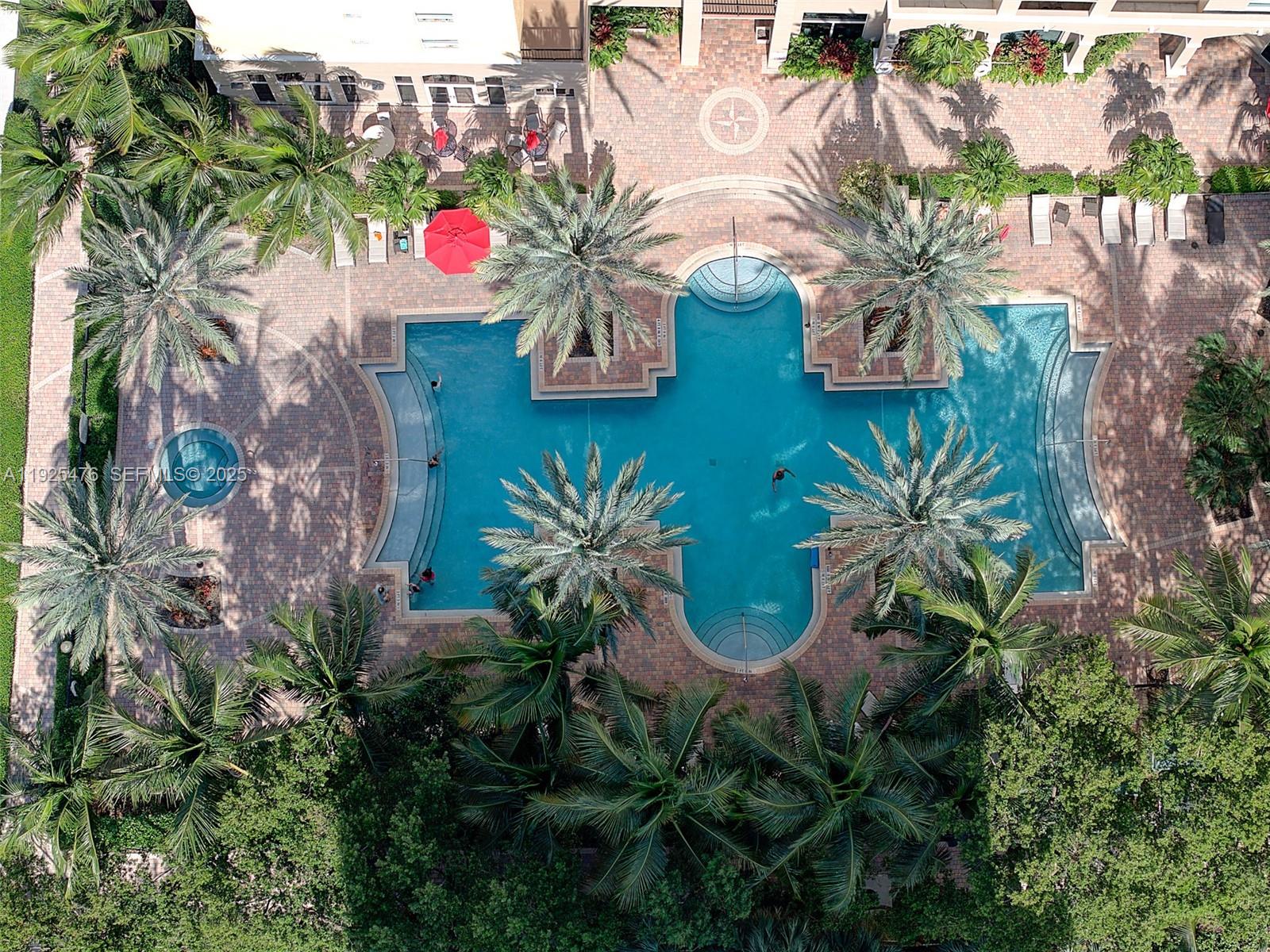 17150 North Bay Road, Unit 2706 Sunny Isles Beach, FL 33160 - Photo 33 of 47 an aerial view of a house with a yard and garden