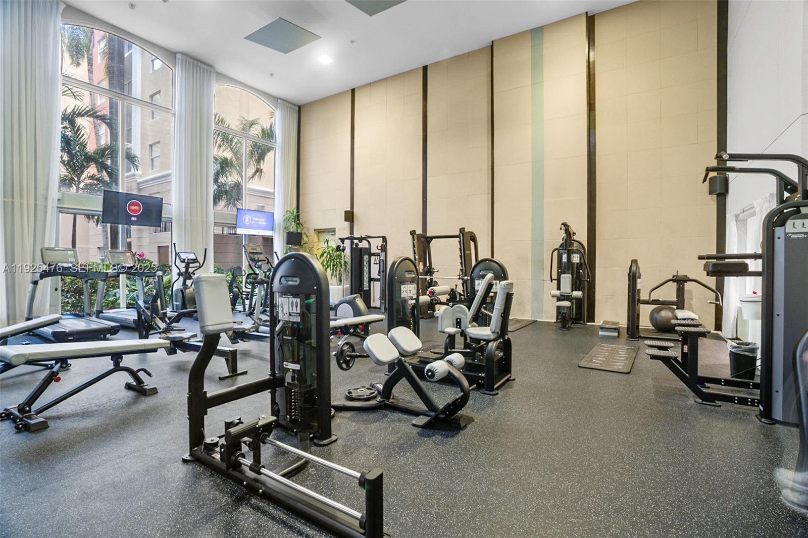 17150 North Bay Road, Unit 2706 Sunny Isles Beach, FL 33160 - Photo 37 of 47 a view of a room with gym equipment
