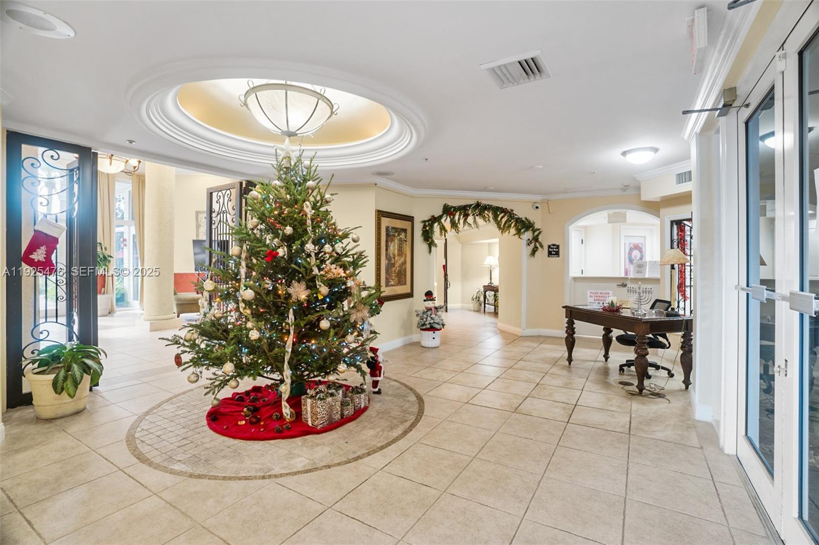 17150 North Bay Road, Unit 2706 Sunny Isles Beach, FL 33160 - Photo 41 of 47 a lobby with furniture and a potted plant