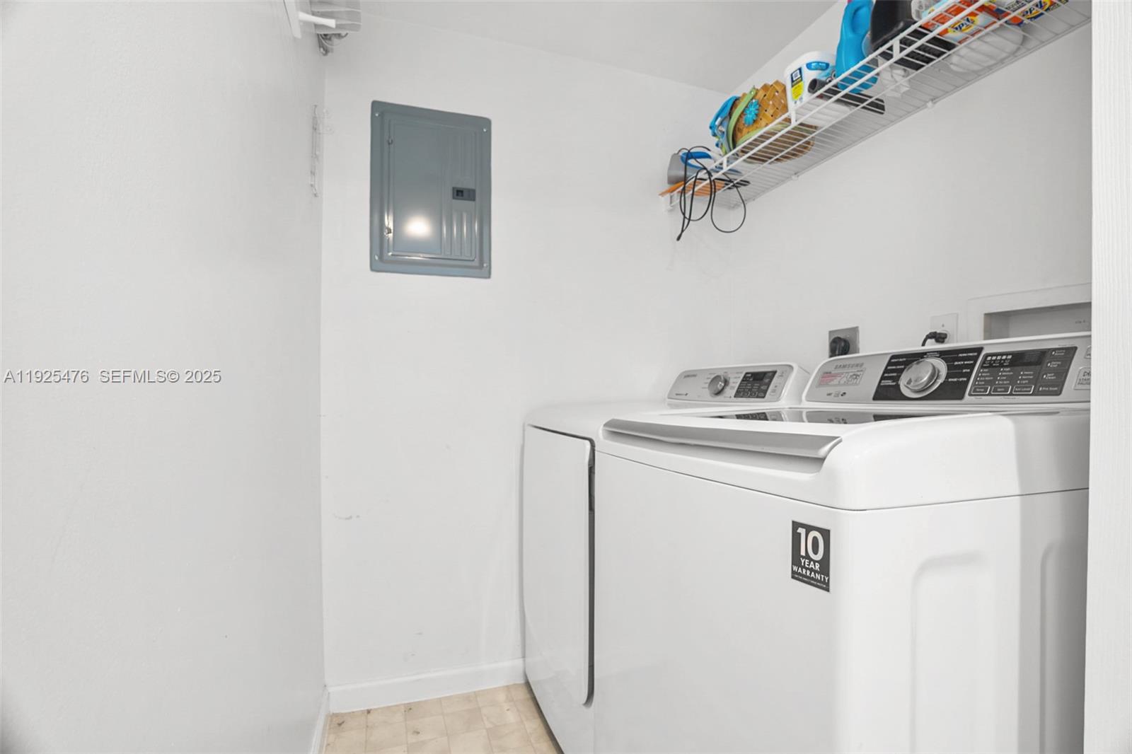 17150 North Bay Road, Unit 2706 Sunny Isles Beach, FL 33160 - Photo 10 of 47 a utility room with dryer and washer