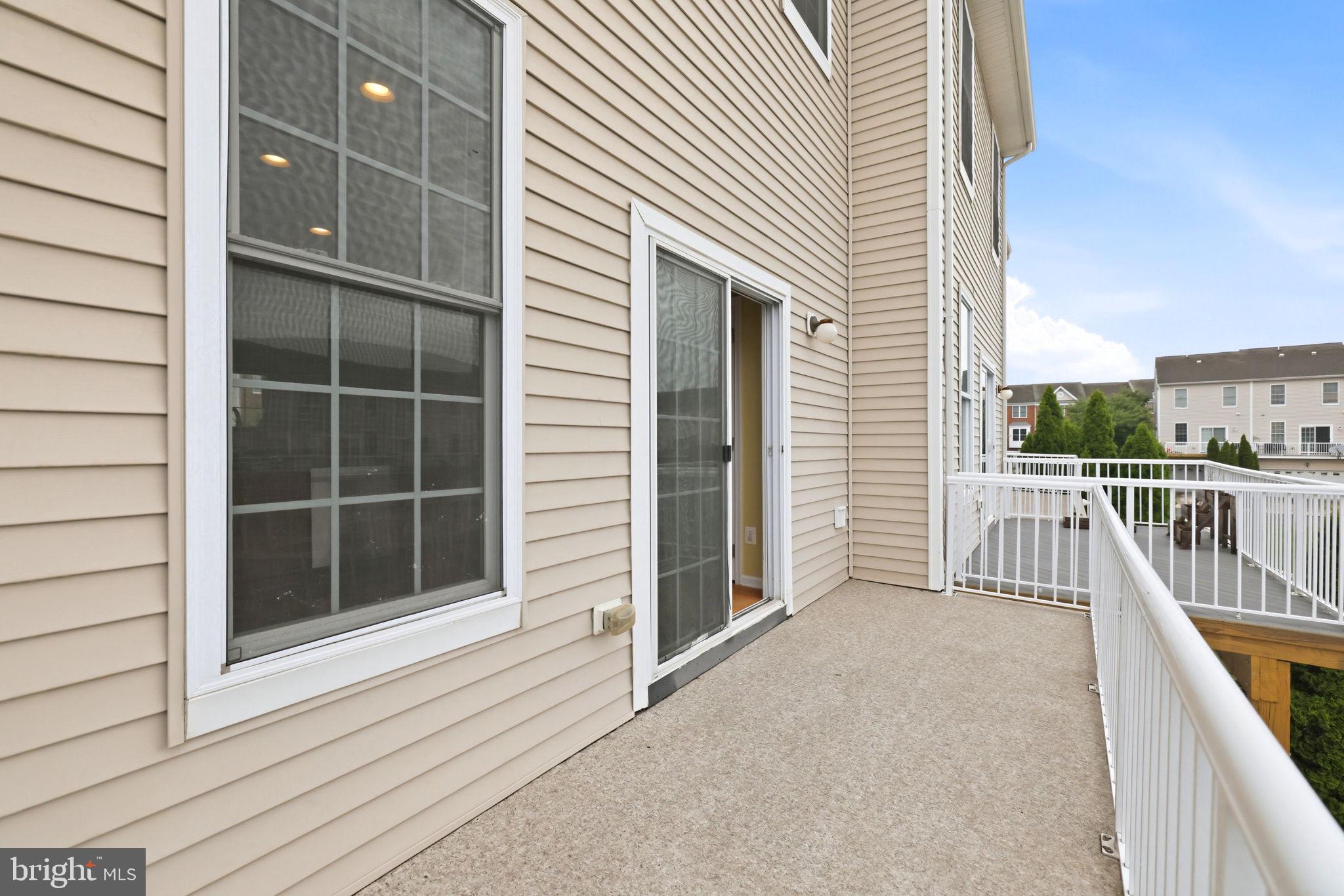 25156 Monteith Terrace Chantilly, VA 20152 - Photo 43 of 72 Spacious balcony with serene views.