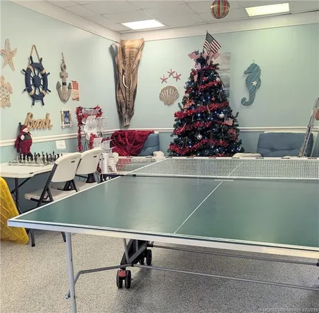 a swimming pool with outdoor seating