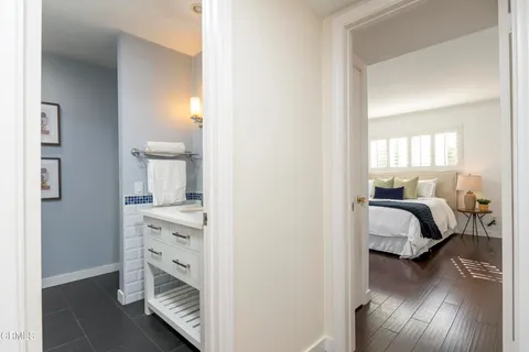 a bedroom with a bed and a view of bedroom