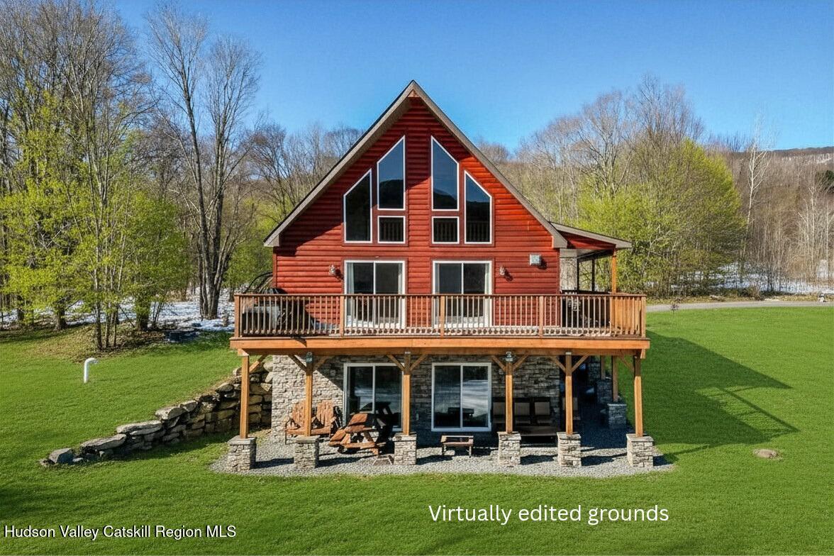 295 Tumbleweed Ranch Road West Kill, NY 12492 - Photo 1 of 49 a view of a house with a yard balcony and sitting area