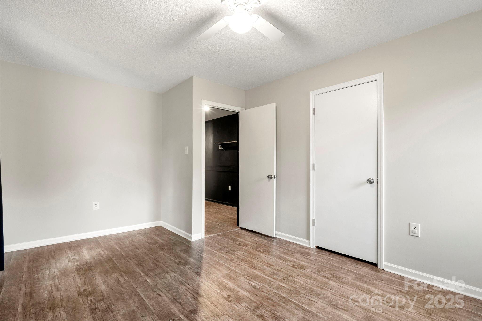 604 Cold Stream Circle Chester, SC 29706 - Photo 15 of 26 a view of an empty room with wooden floor