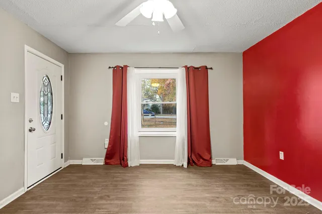 an empty room with windows