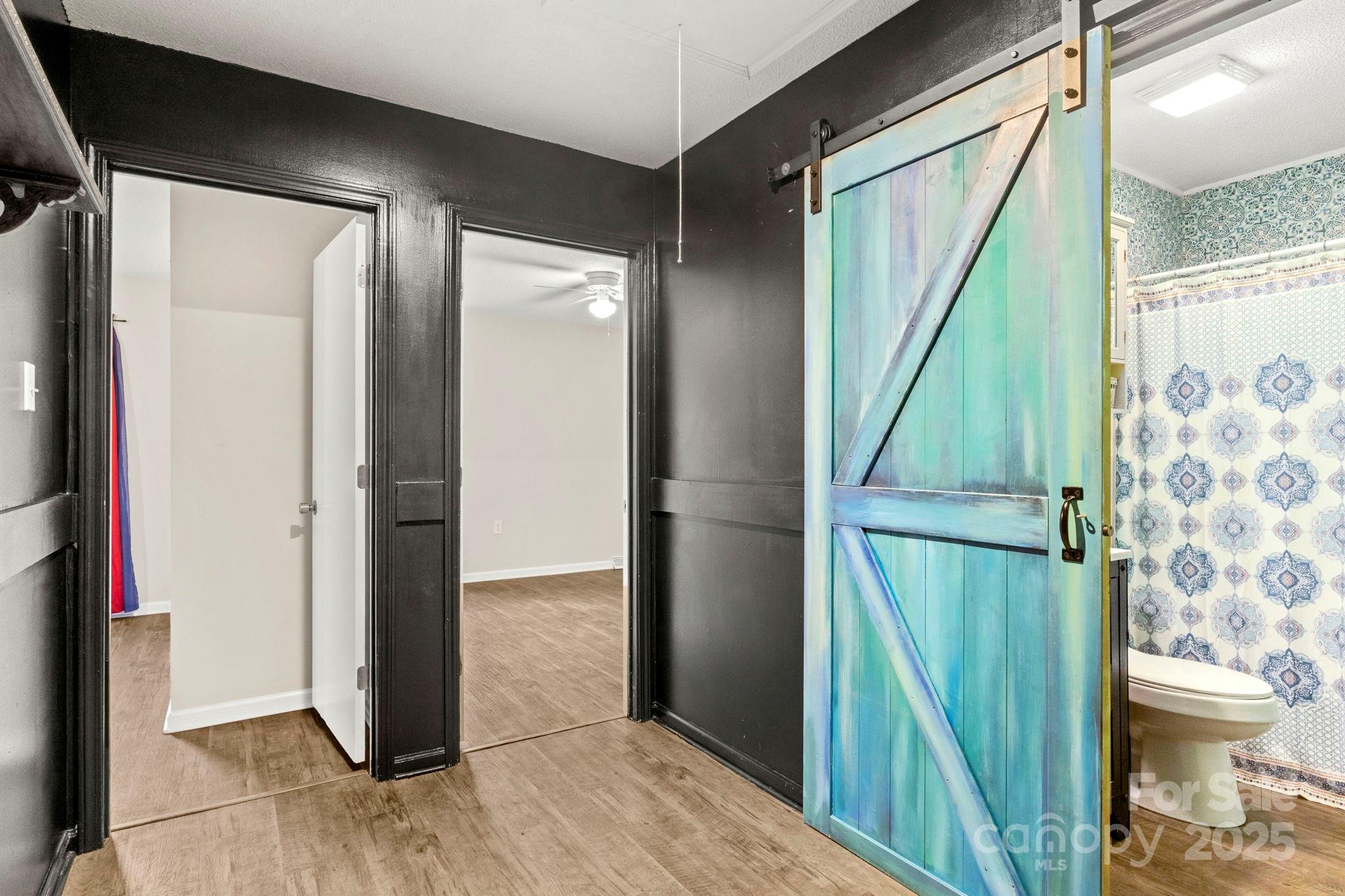 604 Cold Stream Circle Chester, SC 29706 - Photo 9 of 26 a view of a bathroom from a hallway