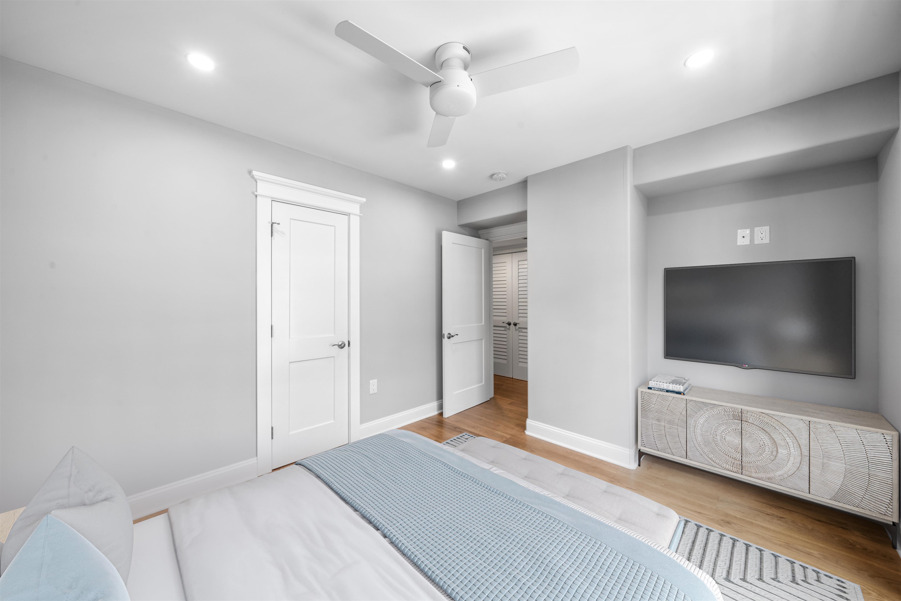 297 24th, Unit 297 Avalon, NJ 08202 - Photo 12 of 49 a bedroom with furniture and flat screen tv