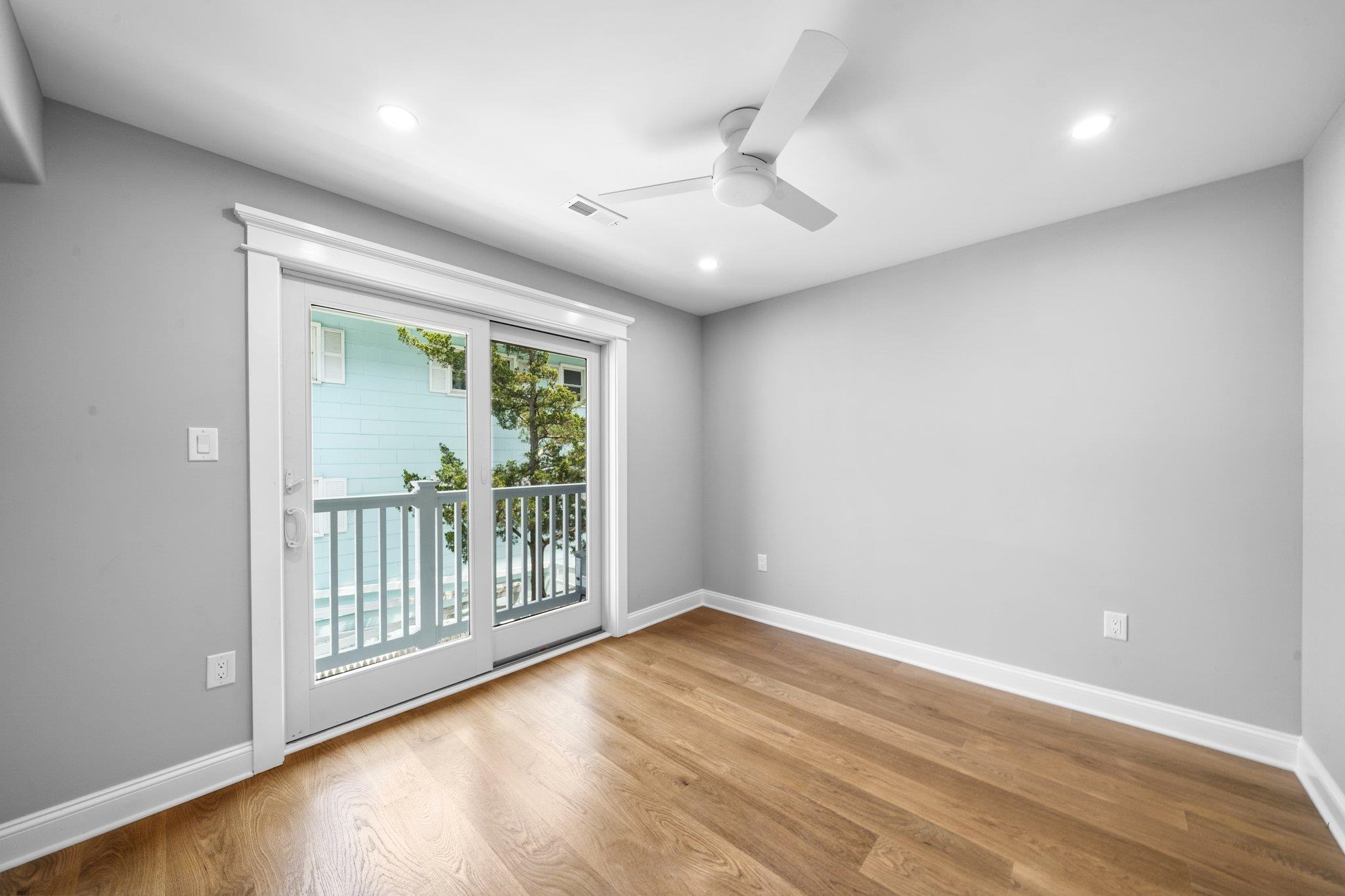 297 24th, Unit 297 Avalon, NJ 08202 - Photo 17 of 49 a view of entryway with wooden floor