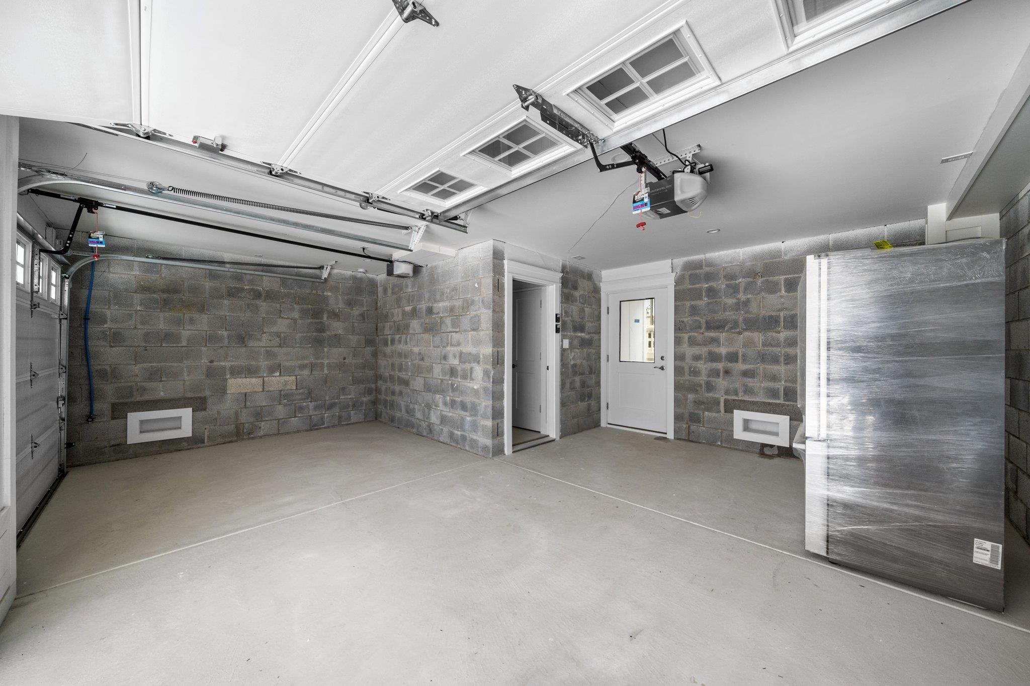 297 24th, Unit 297 Avalon, NJ 08202 - Photo 45 of 49 a view of an empty room with a storage