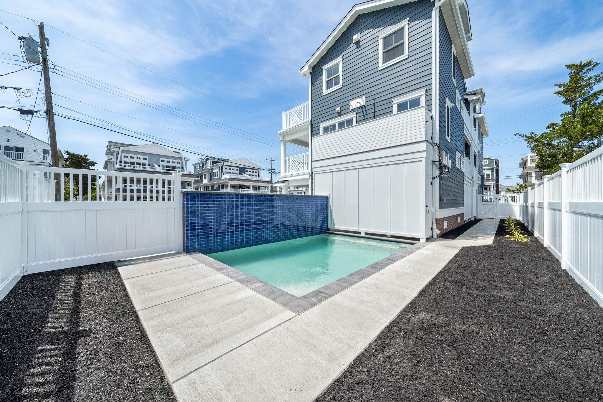 297 24th, Unit 297 Avalon, NJ 08202 - Photo 47 of 49 a view of a house with a yard