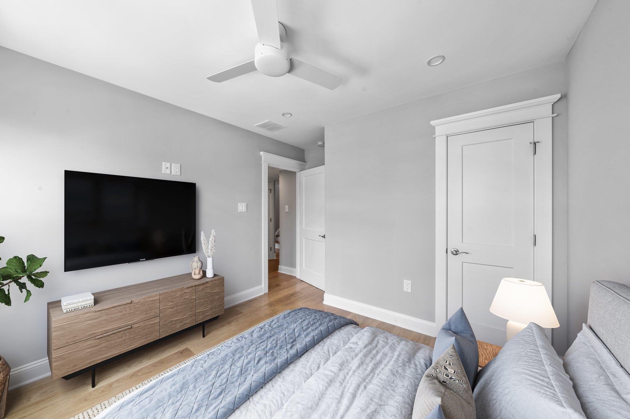 297 24th, Unit 297 Avalon, NJ 08202 - Photo 10 of 49 a living room with furniture and a flat screen tv
