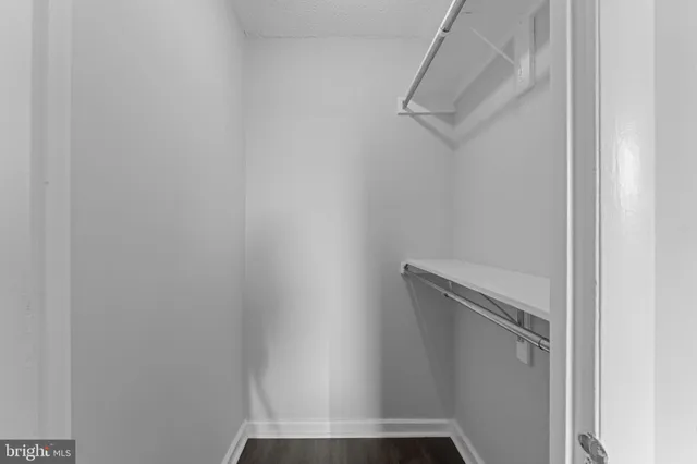 a view of a hallway with washer and dryer